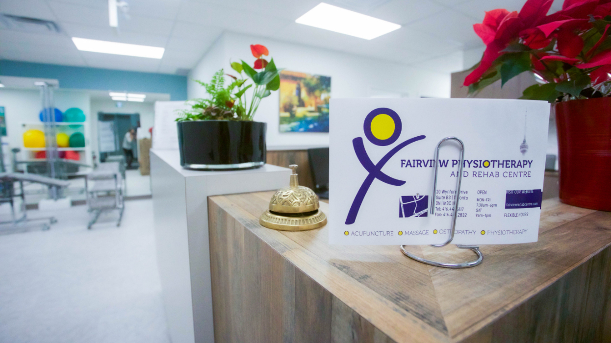 closeup of reception desk at our Wynford Location