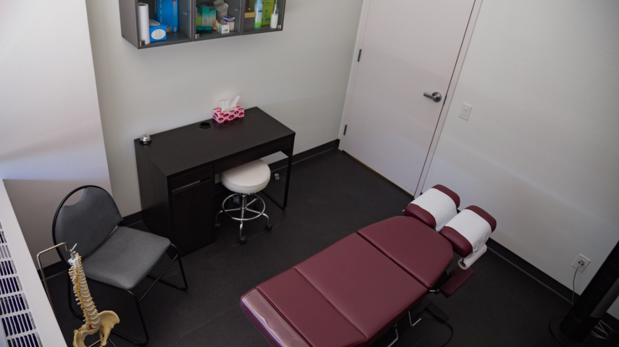 Bird's eye view of the chiropractic room. Updated with a new bed and desk